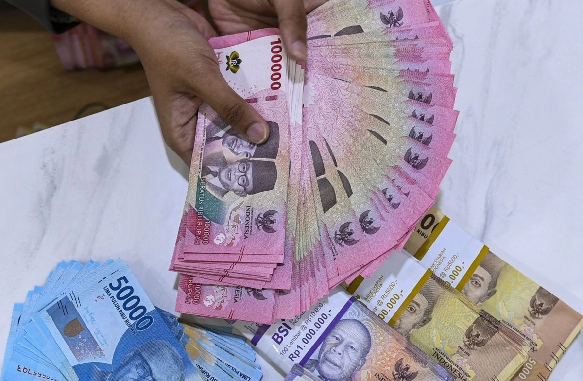 Rupiah Tetap Stabil di Tengah Tekanan Global, BI Tahan Suku Bunga